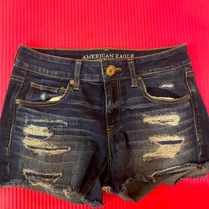 Ca Size 8 dark blue ripped style American Eagle jean shorts